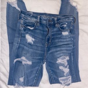 Super High Rise Distressed Skinny Jegging.